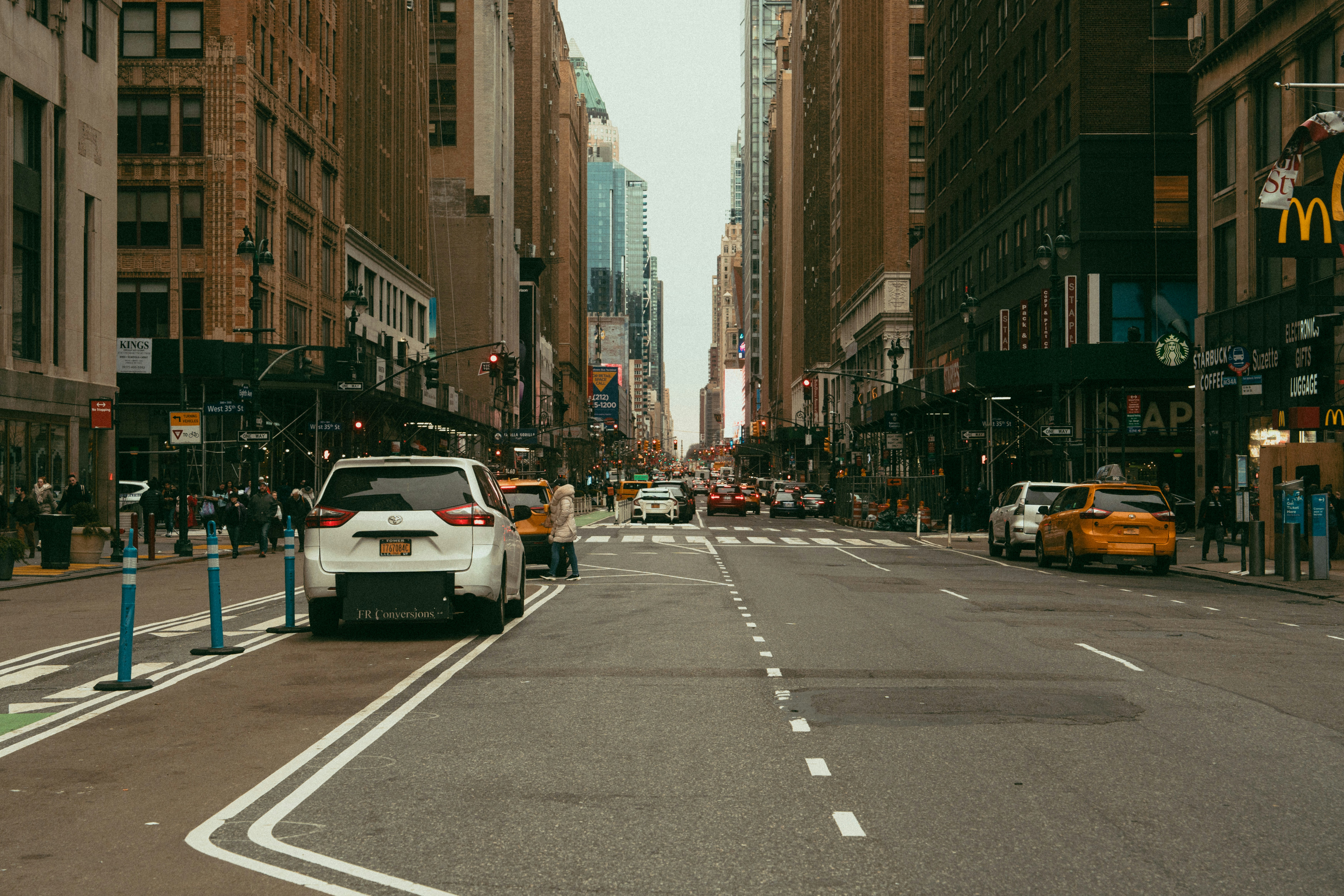 A city street filled with traffic and tall buildings photo – Free New ...