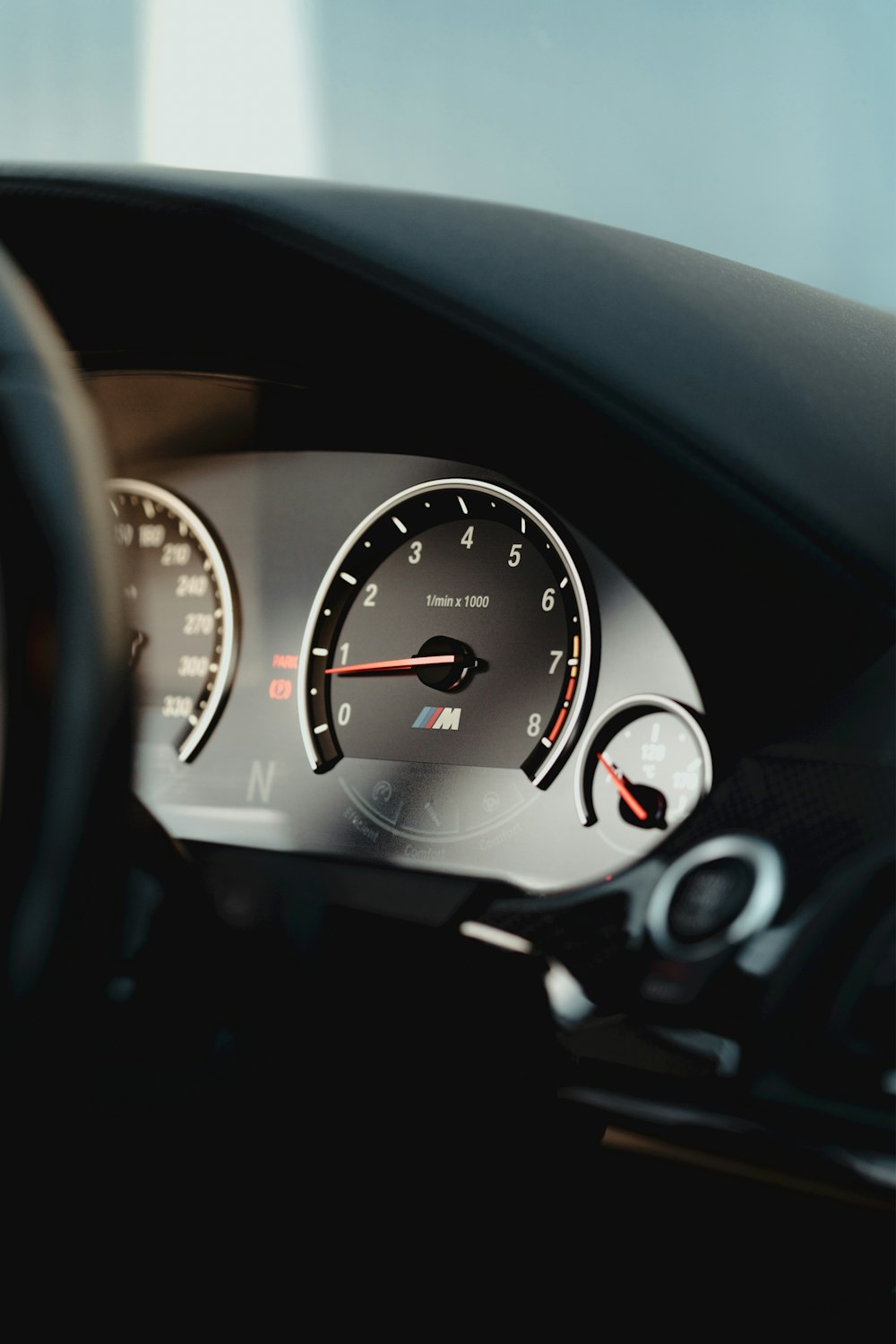 the dashboard of a car with a speedometer