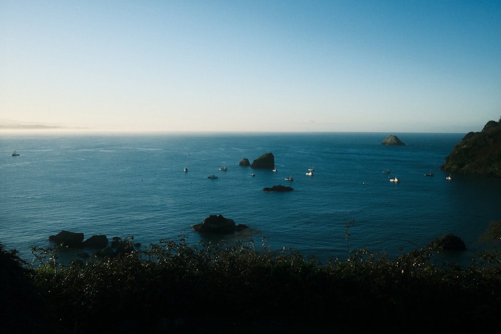 a body of water with boats floating in it