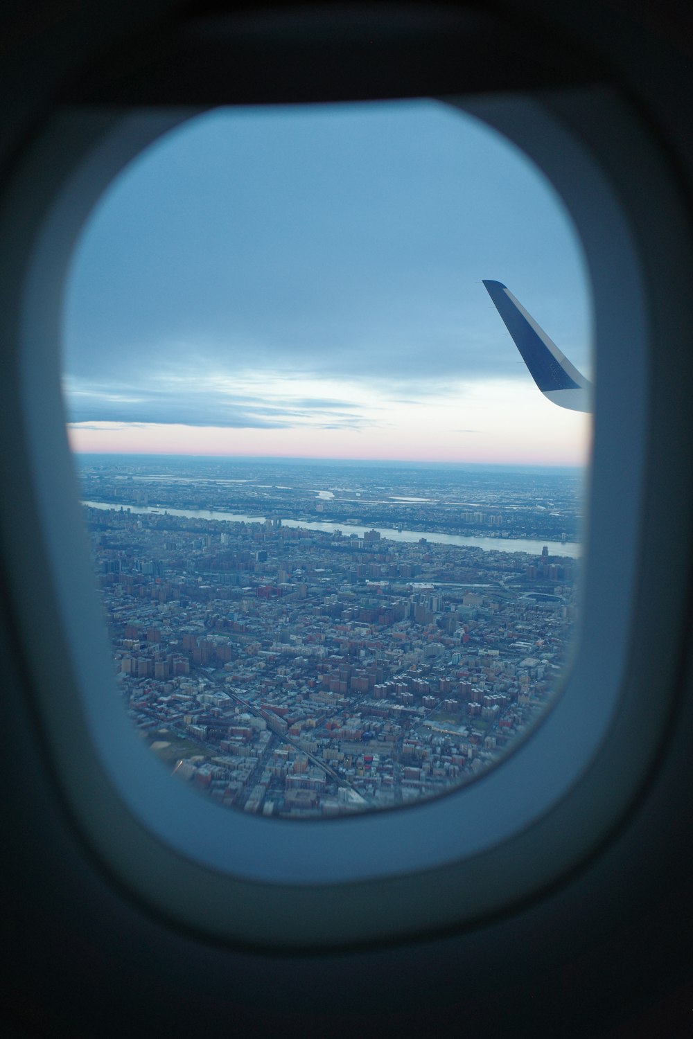 a view of a city from an airplane window