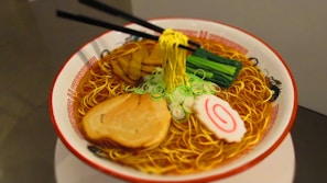 A vibrant plate of Naruto ramen styled with animated steam effects, inspired by the famous anime dish.