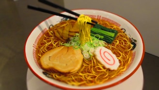 A vibrant plate of Naruto ramen styled with animated steam effects, inspired by the famous anime dish.