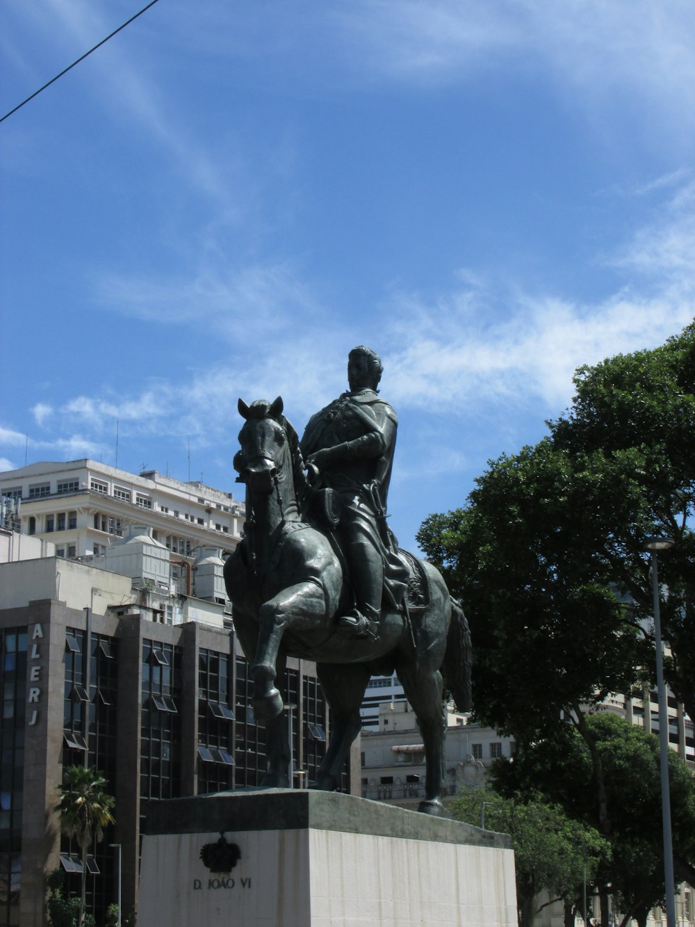 a statue of a man riding on the back of a horse