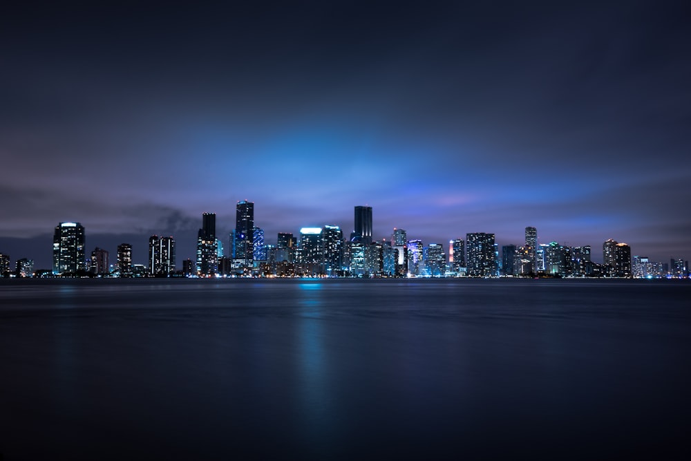 a view of a city at night from across the water