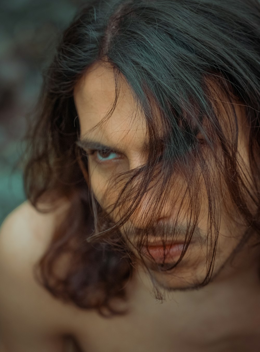 a close up of a person with long hair