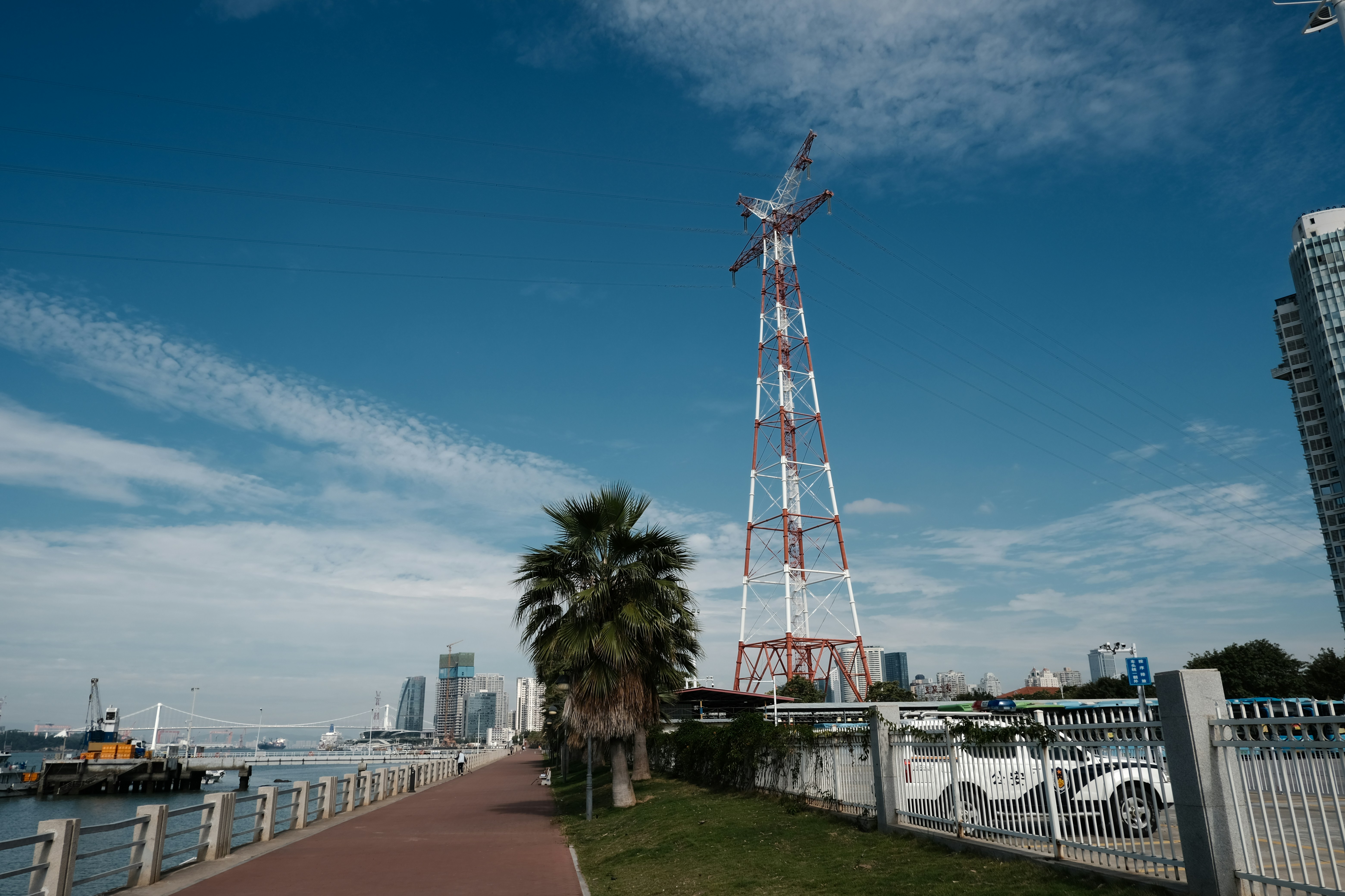 a tall tower next to a body of water