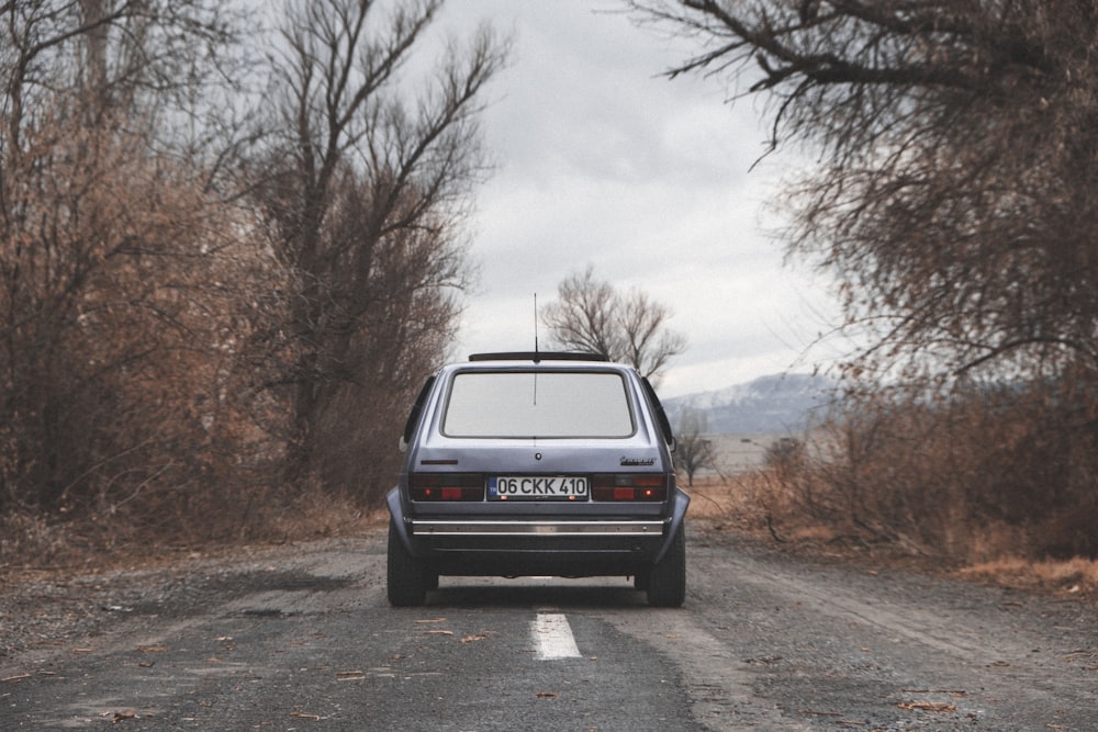 a car is parked on the side of the road