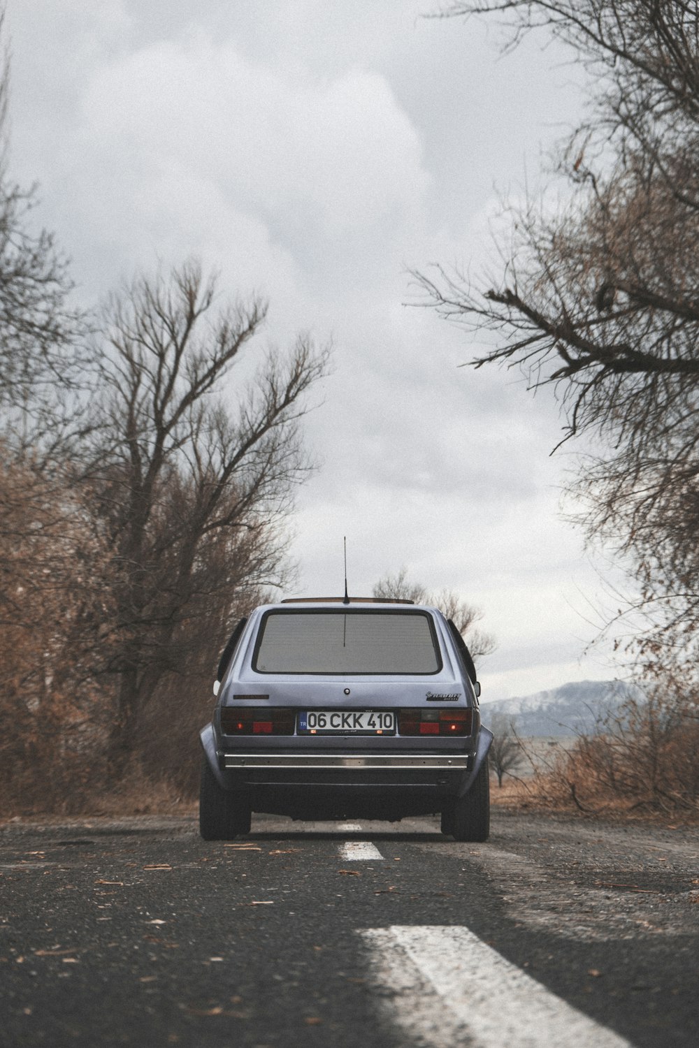 a car is parked on the side of the road