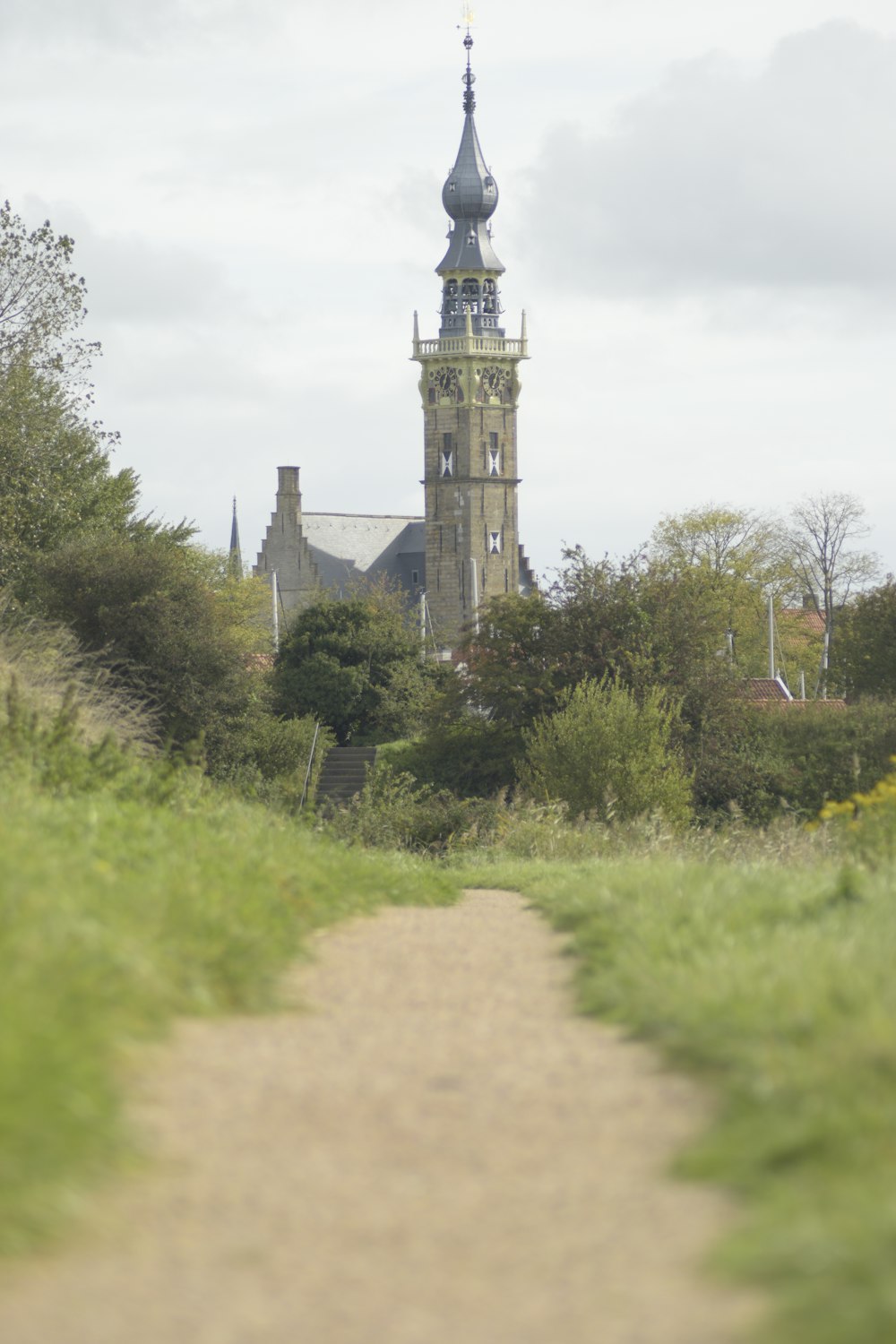 a tall tower with a clock on top of it