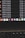 A computer screen displays a list of files with details such as timestamps, file sizes, and formats in a dark-themed interface. The bottom part of the screen shows various application icons on a MacOS dock, including familiar apps like VLC, WhatsApp, and Apple Music. A keyboard is partially visible at the bottom.