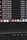 A computer screen displays a list of files with details such as timestamps, file sizes, and formats in a dark-themed interface. The bottom part of the screen shows various application icons on a MacOS dock, including familiar apps like VLC, WhatsApp, and Apple Music. A keyboard is partially visible at the bottom.