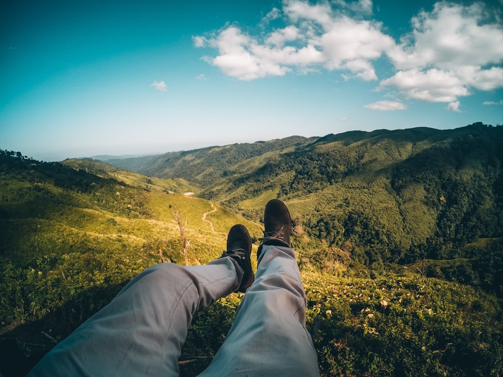 a person with their feet up in the air