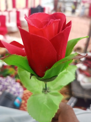 Close-up of colorful artificial roses with delicate petals and realistic textures.