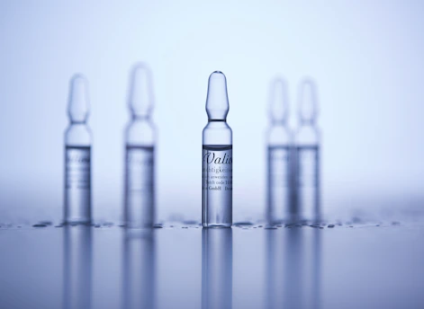 a group of small bottles sitting on top of a table