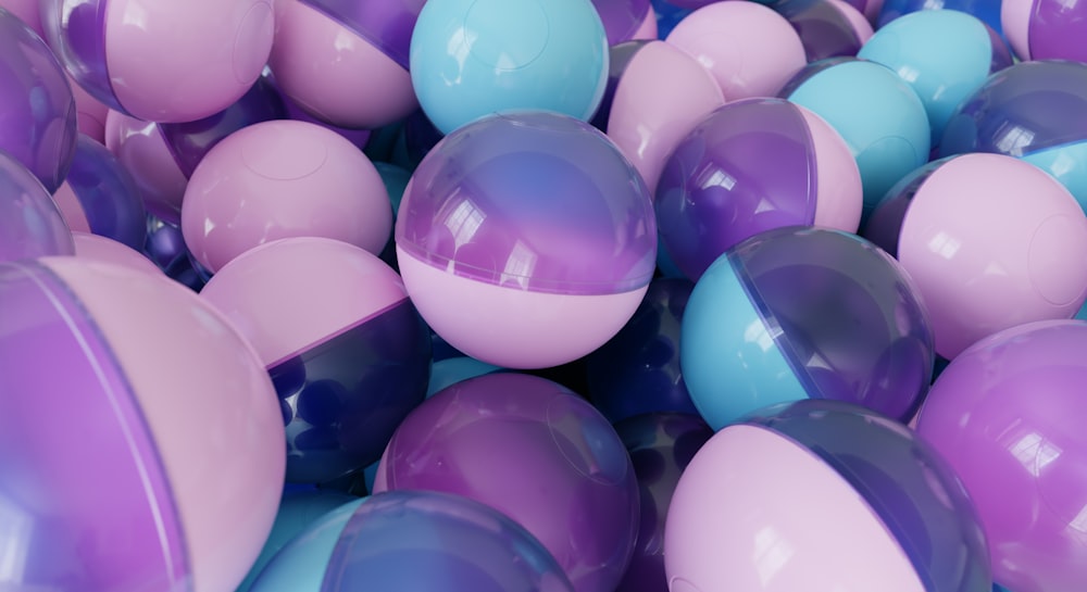 a bunch of balloons that are purple and blue