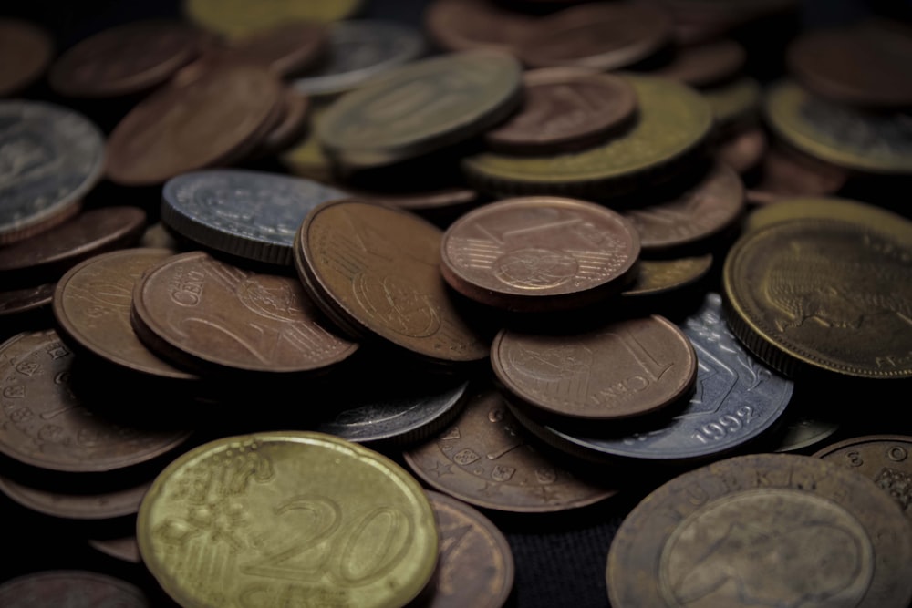 a pile of coins sitting on top of a table