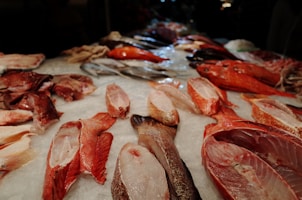Assortment of fresh seafood displayed on ice at a market