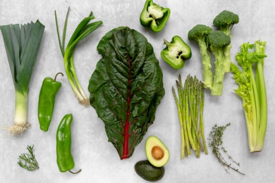 a variety of vegetables are laid out on a table