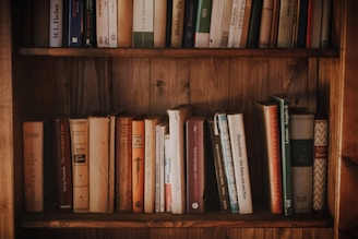 a book shelf filled with lots of books