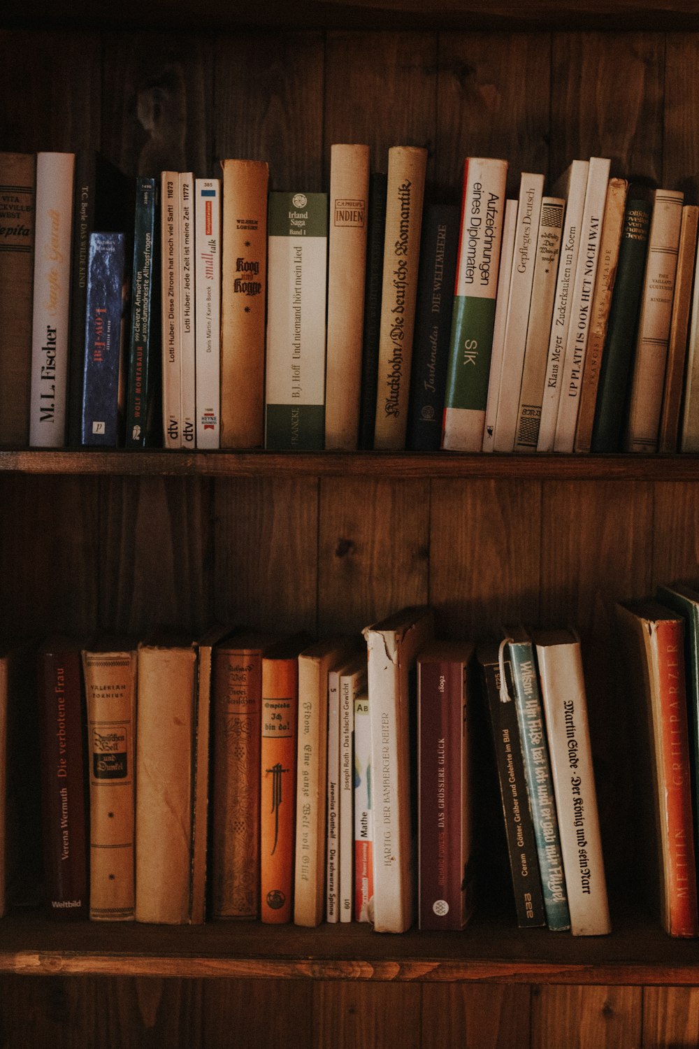 a book shelf filled with lots of books