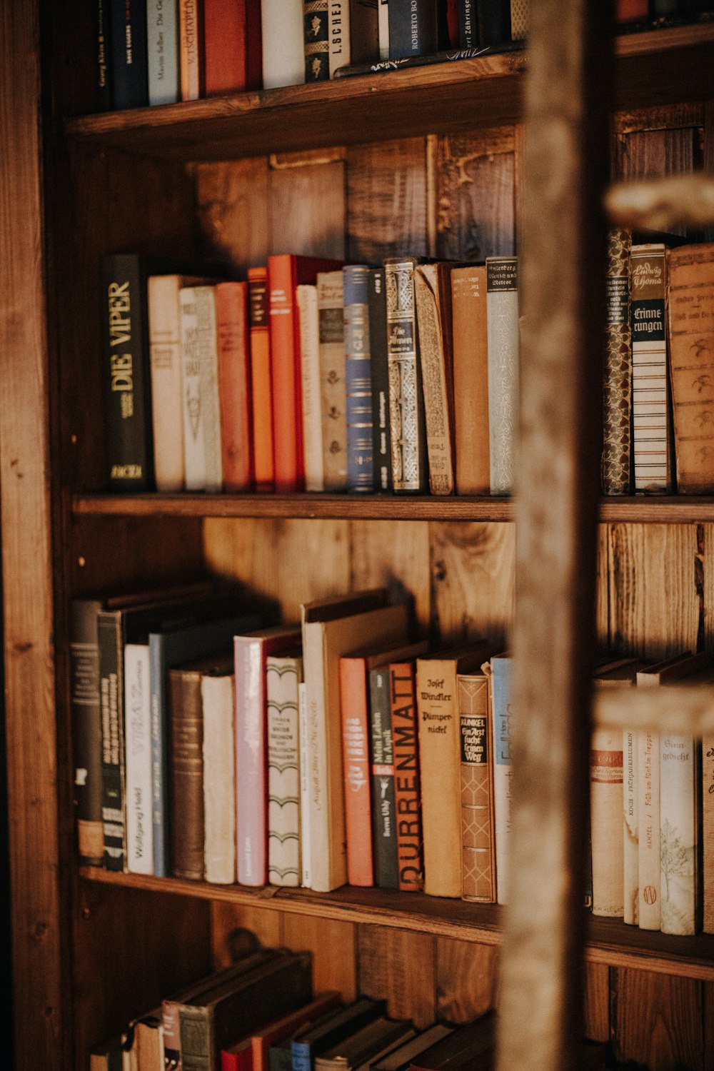 a book shelf filled with lots of books