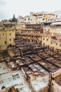 a group of old buildings with lots of windows