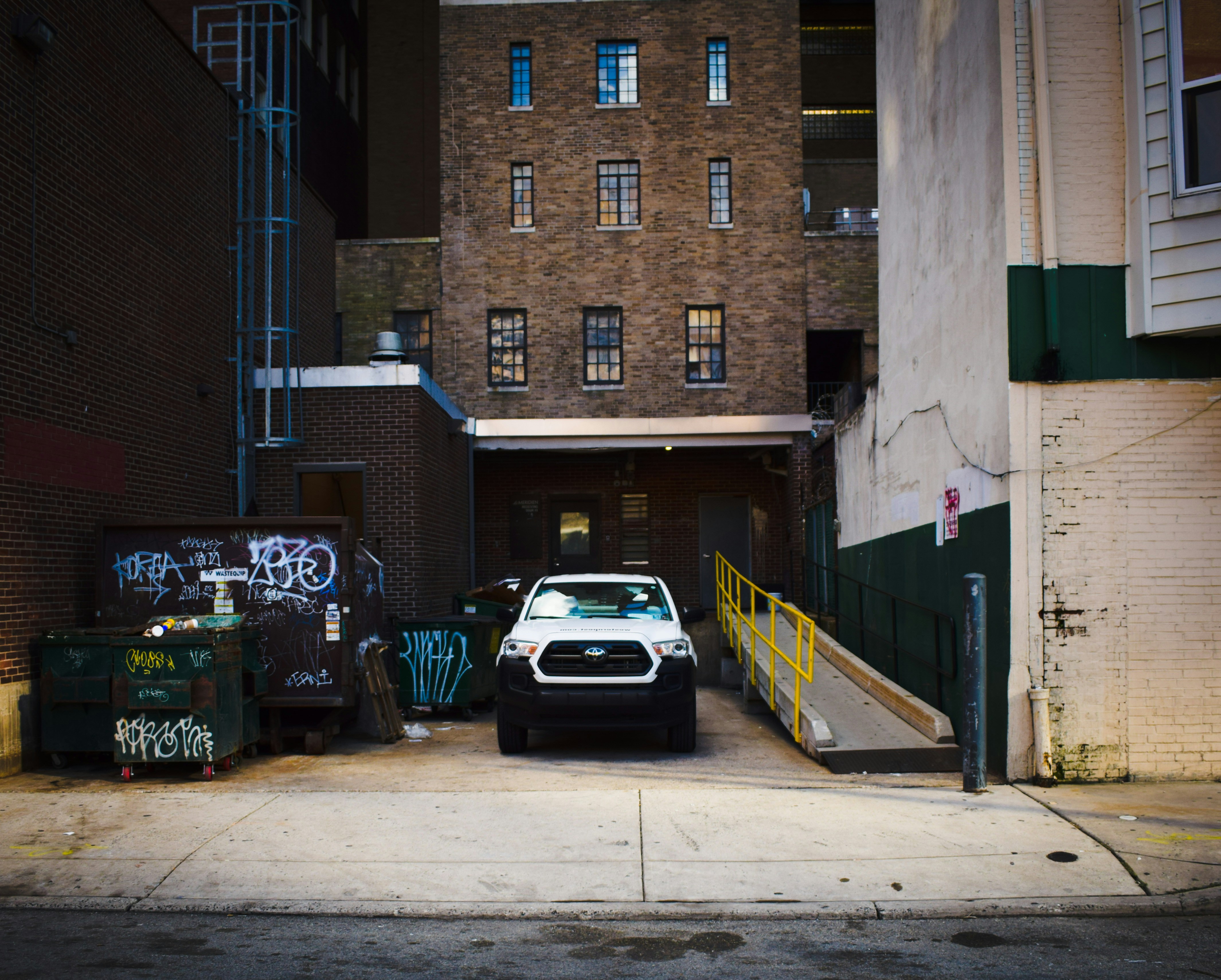 a car parked on the side of a street