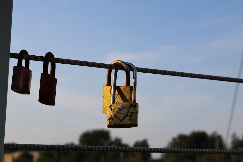 a couple of padlocks that are on a wire