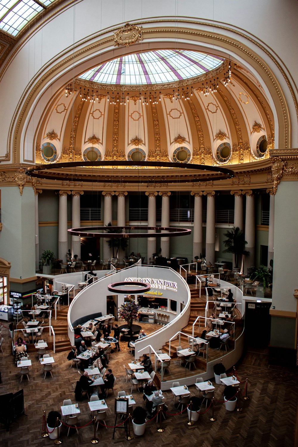 an overhead view of a dining hall with tables and chairs