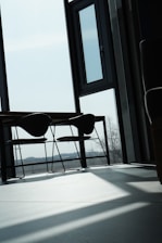 Close-up of a stylish, functional interior space filled with natural light at Hill Residence.