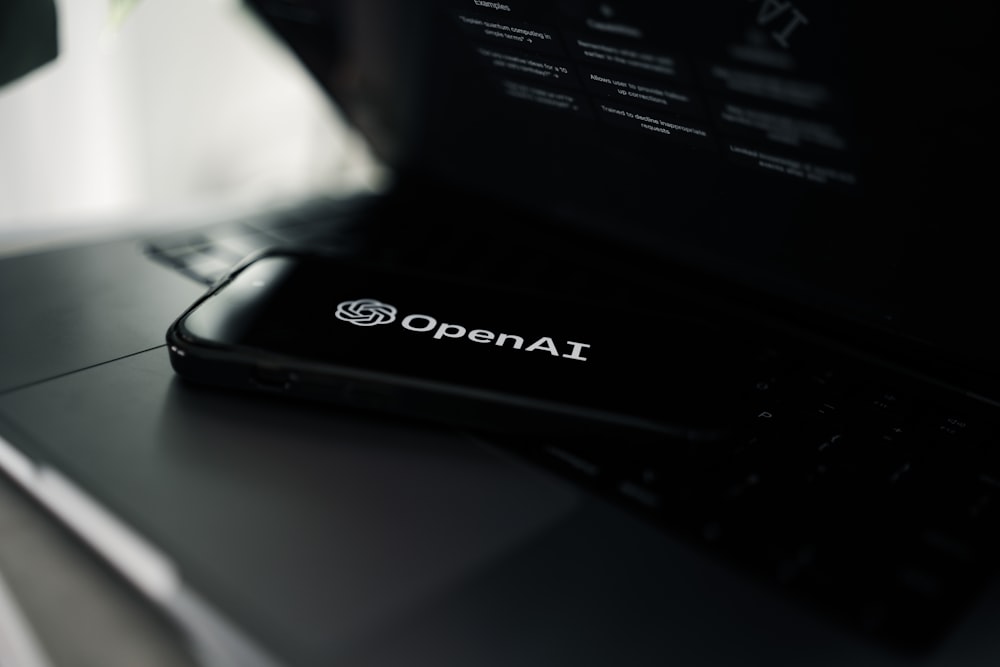 a close up of a laptop on a desk