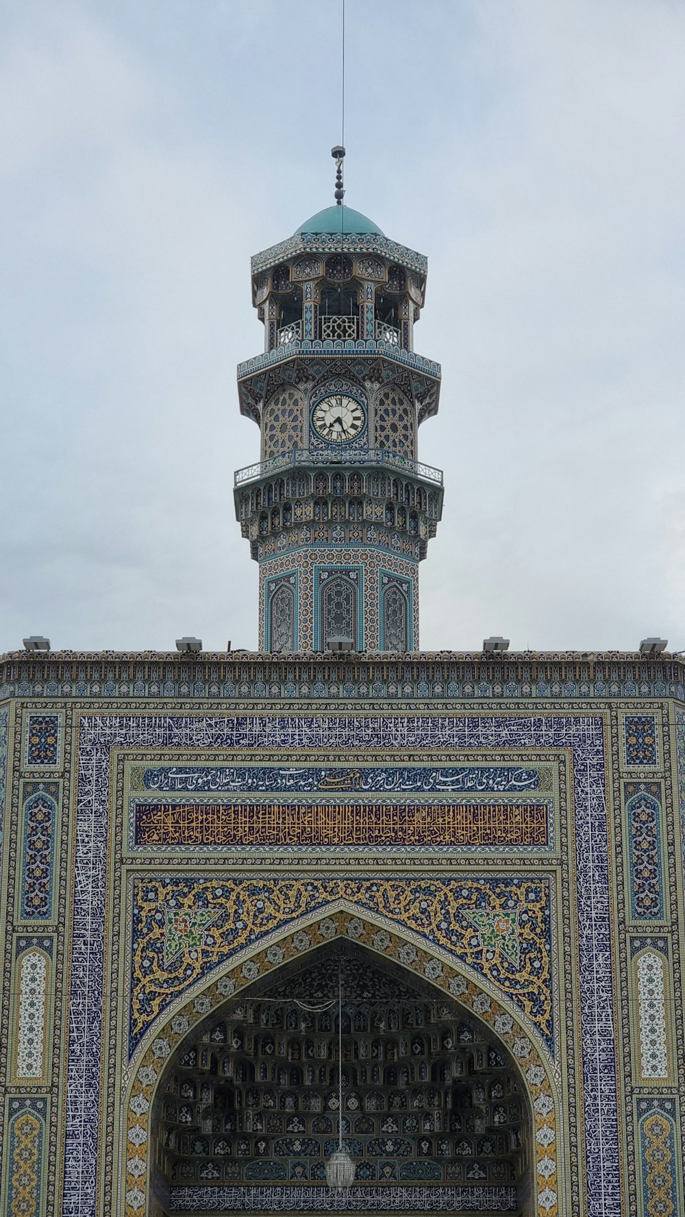 a tall building with a clock on the top of it