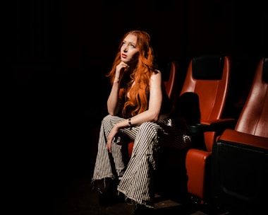 Close-up of Sue Maclaine deep in thought during a rehearsal.