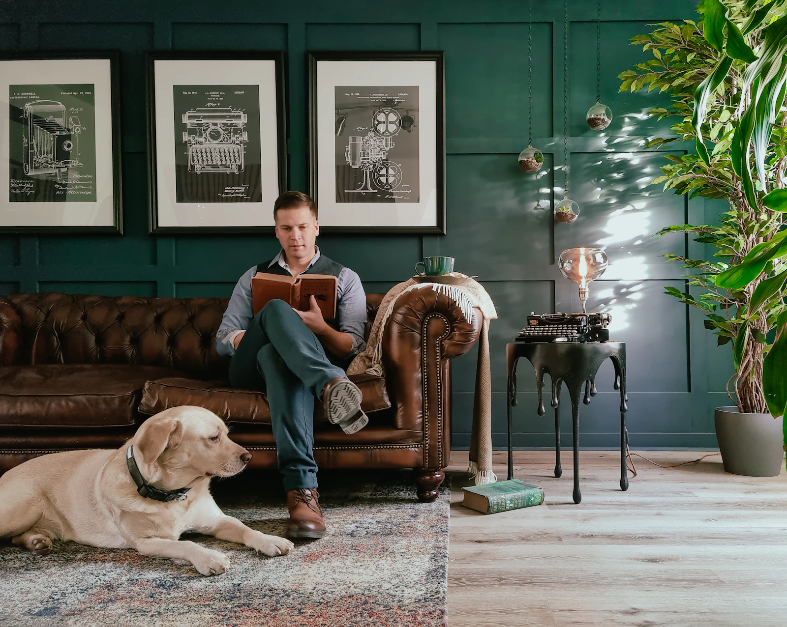 Pet parent relaxing at home with Labrador