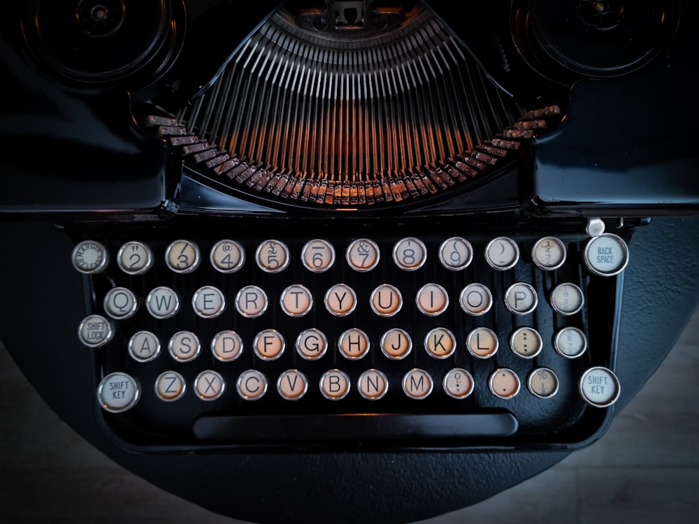 a close up of an old fashioned typewriter