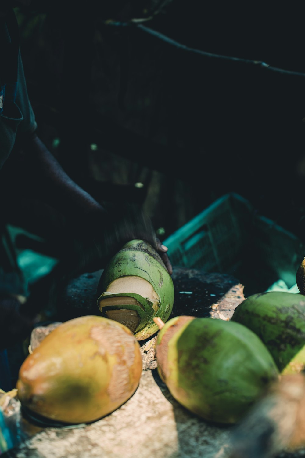 a pile of fruit sitting on top of a table