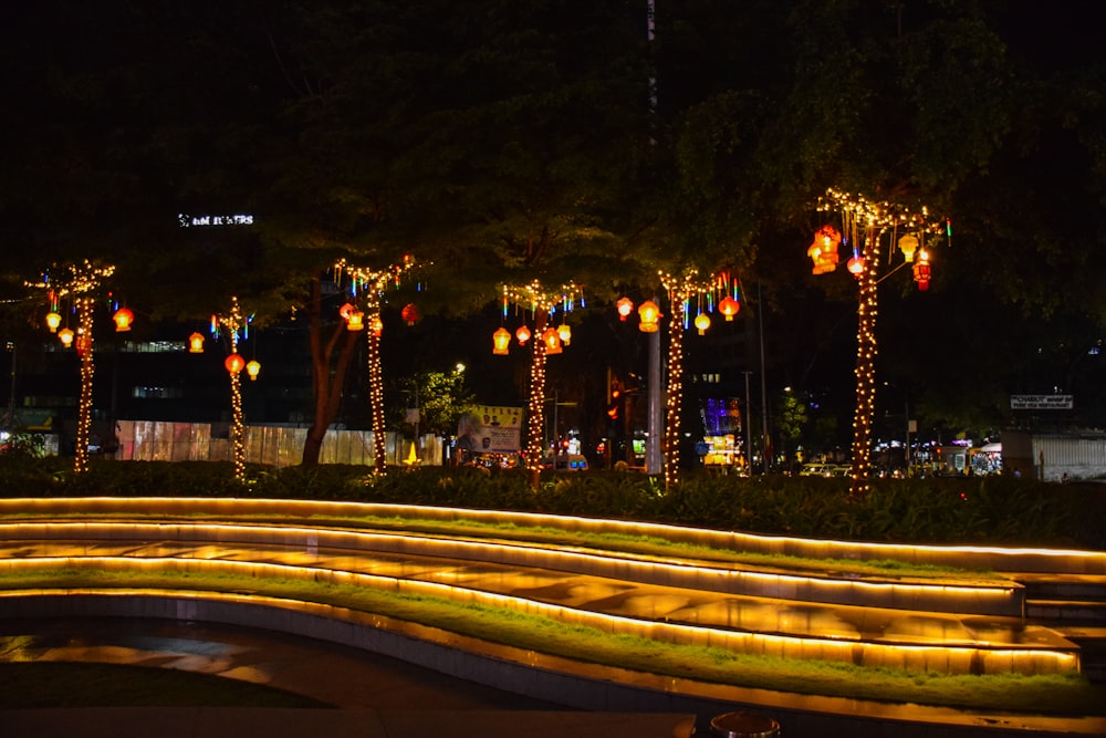 a bunch of lights that are on the side of a road