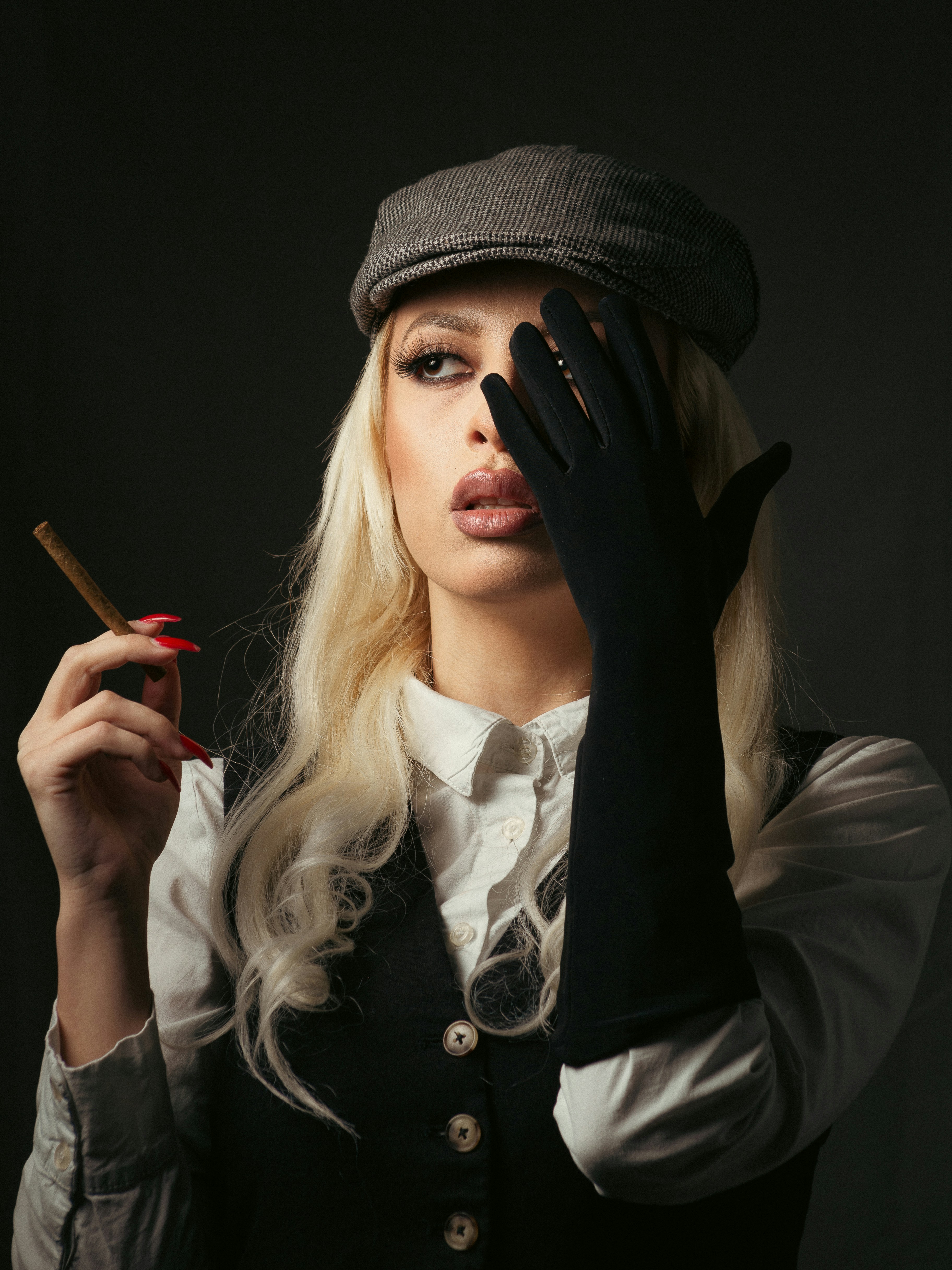 a woman with a cigarette in her hand