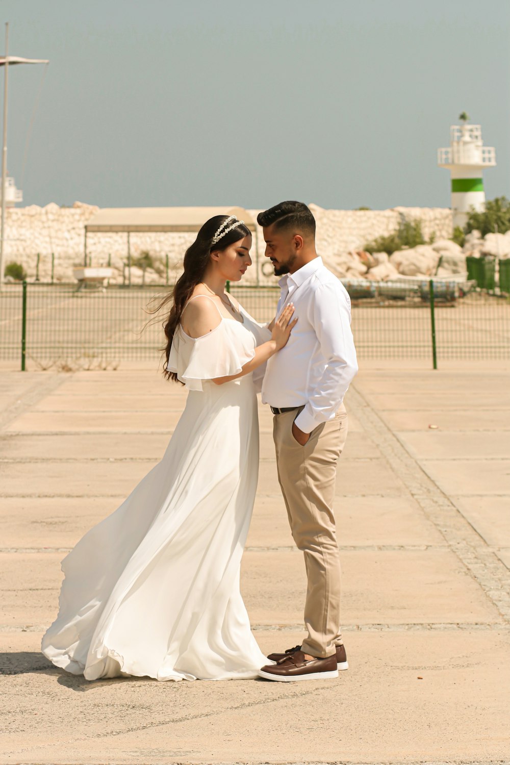 a man and a woman standing next to each other