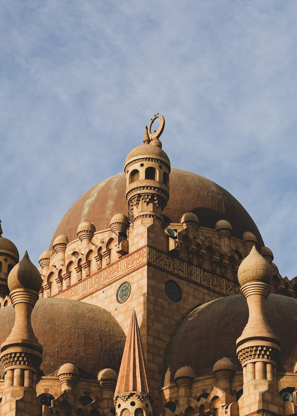 a large building with a clock on the top of it