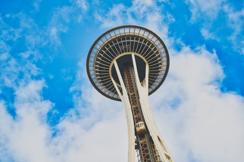 a tall tower with a sky background