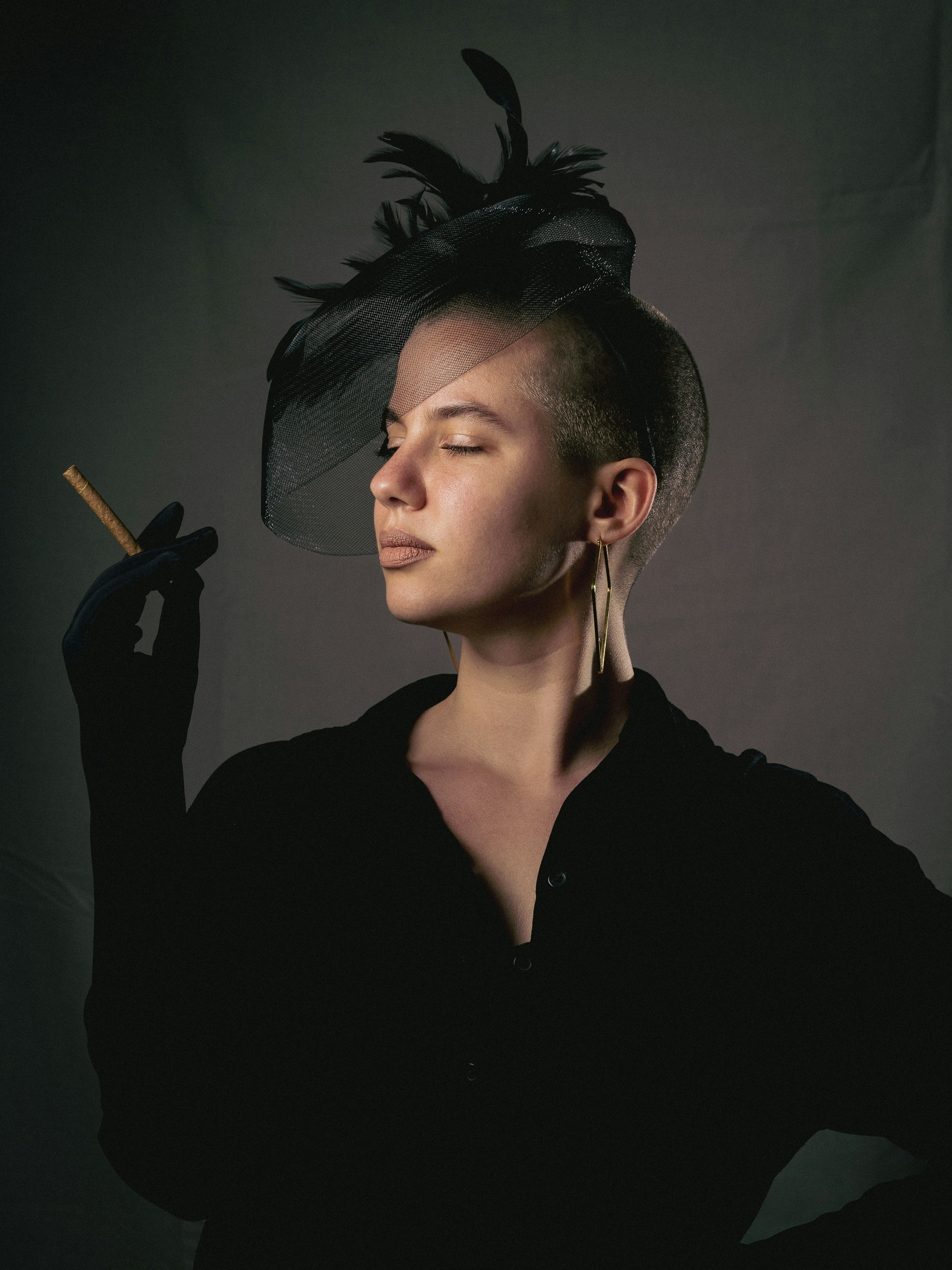 a woman with a cigarette in her hand