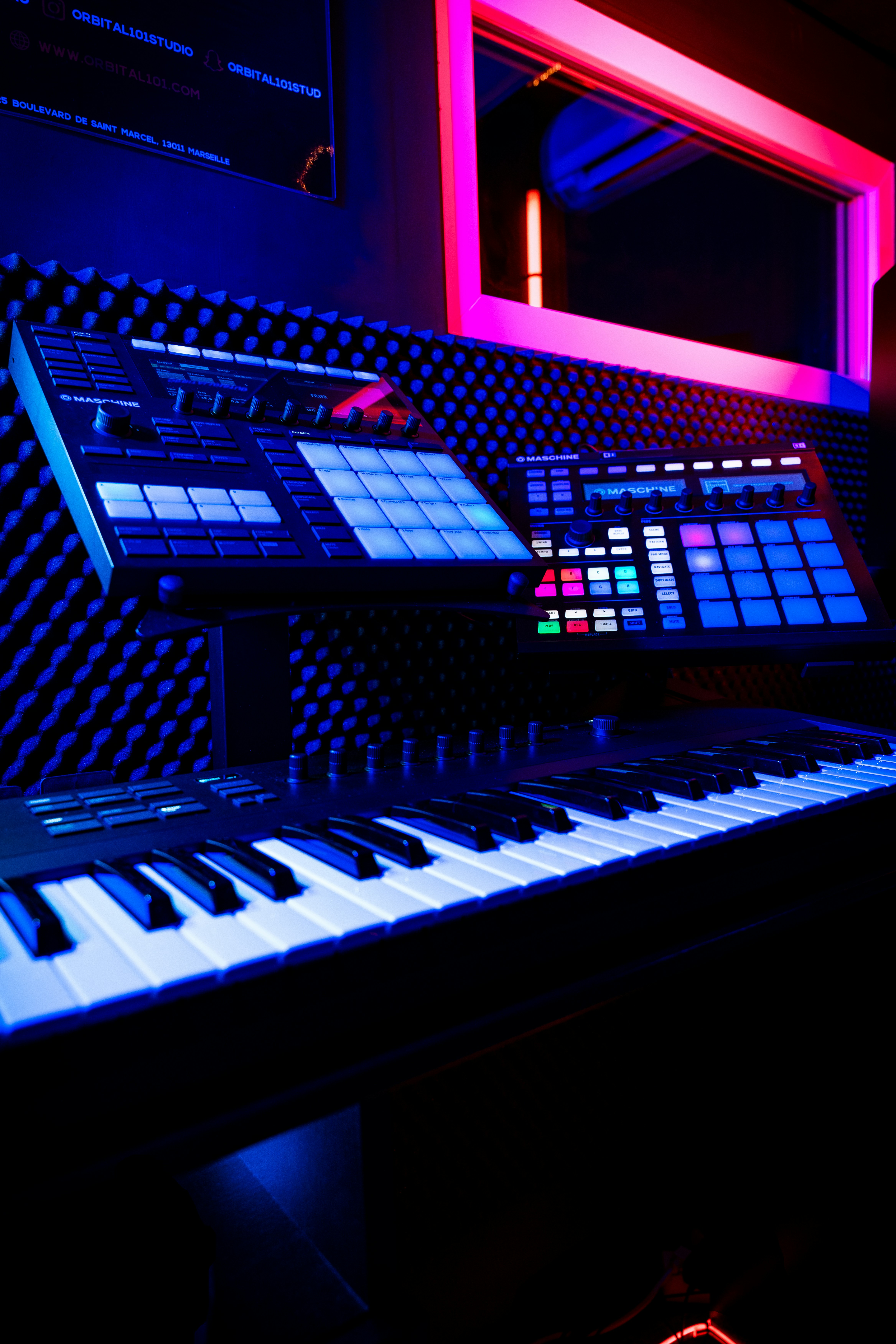 a keyboard is lit up in a dark room