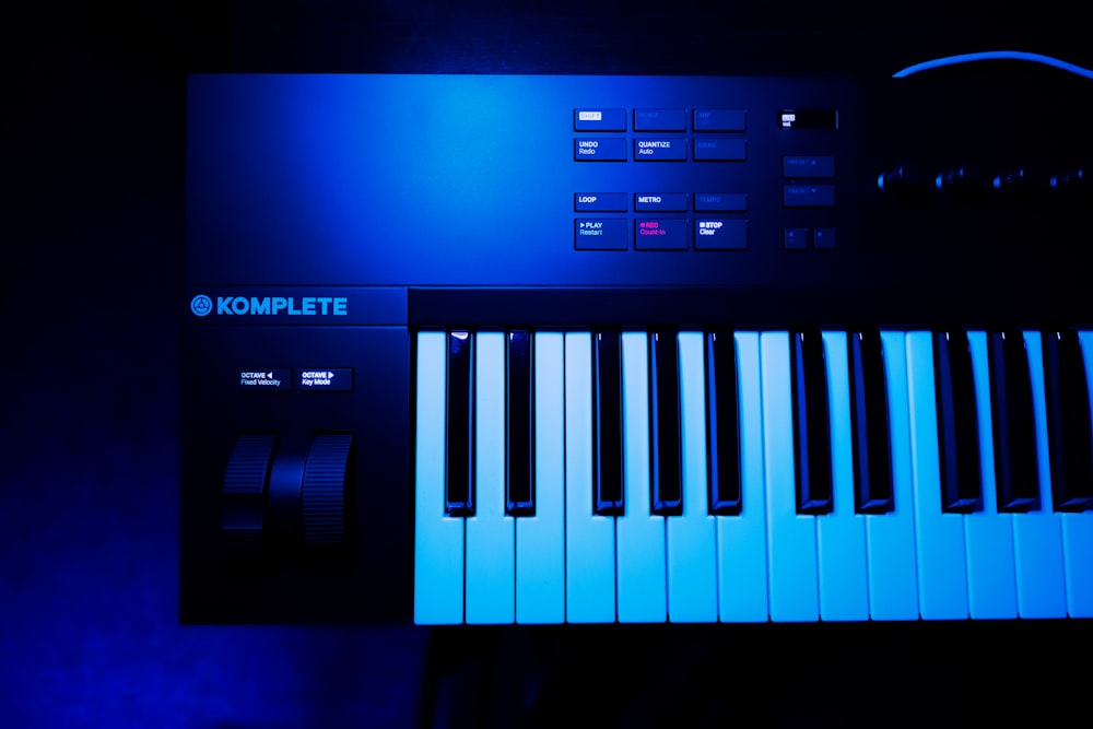 a close up of a keyboard in a dark room