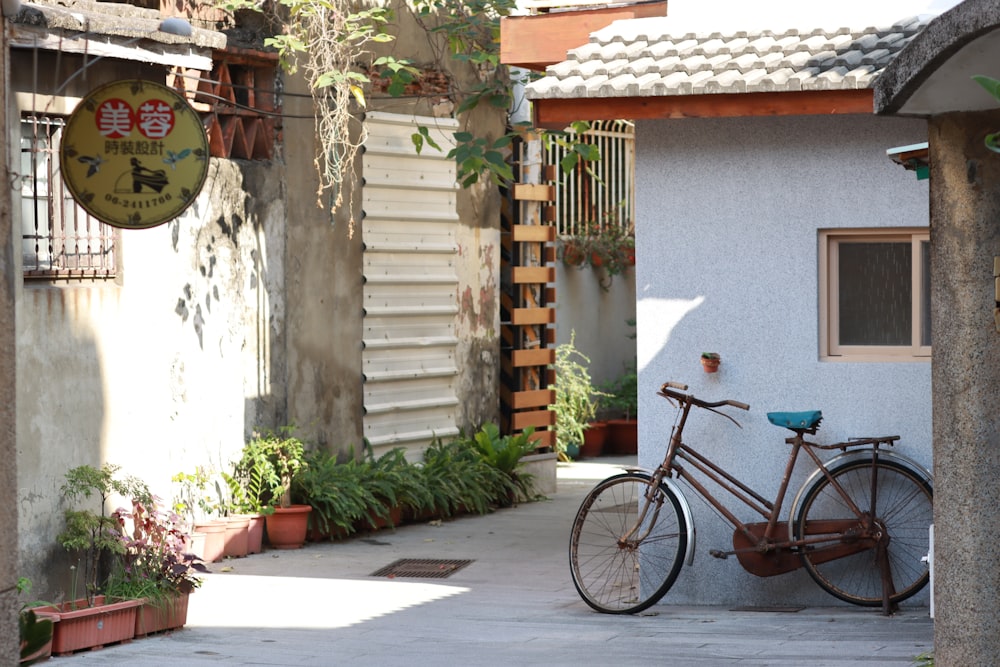 a bicycle parked in front of a building