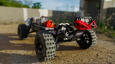 Suspension springs and shocks set against a rugged dirt trail backdrop