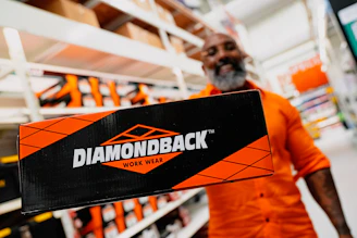 A friendly team member at Roberson Supply Company ready to assist with your workwear needs.