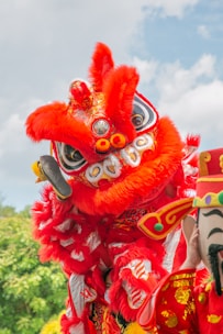 Colorful illustration of Leo the Lion singing joyfully under a circus tent.