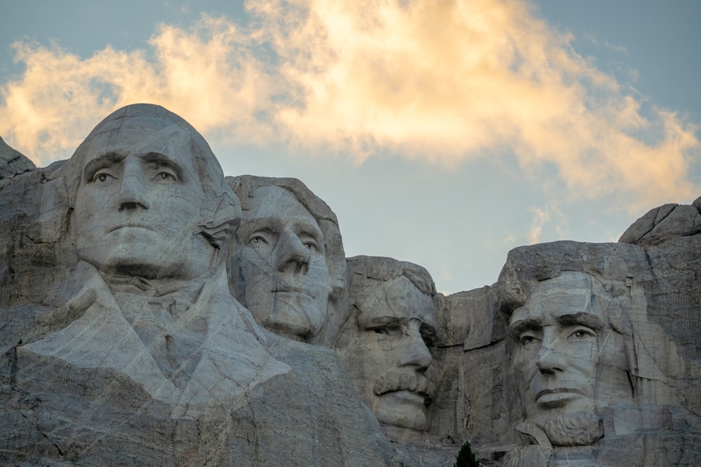 a group of presidents carved into the side of a mountain