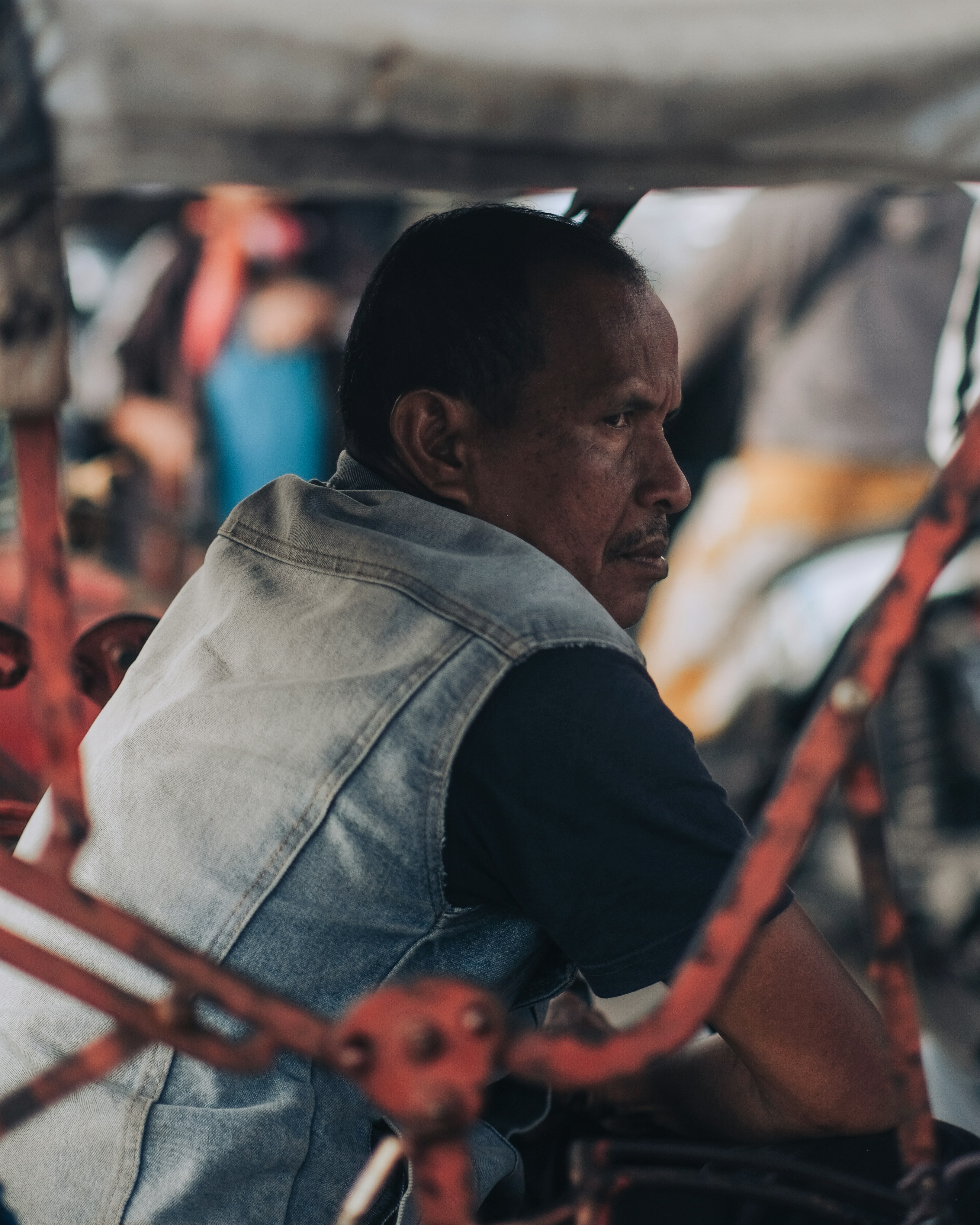 a man is sitting in a small vehicle